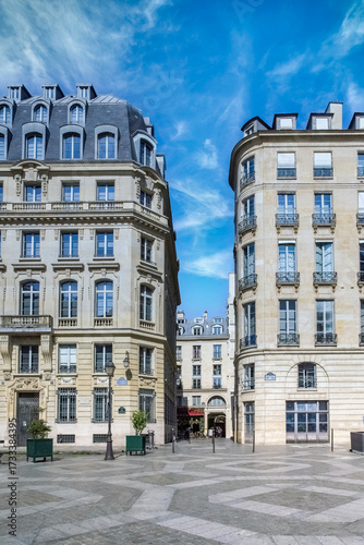 Fototapeta Naklejka Na Ścianę i Meble -  Paris, beautiful buildings, place des Petits-Peres, in the 2e arrondissement, blue sky

