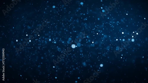 Floating Sparkling Particles on Dark Blue Background