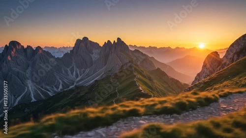 Majestic Mountain Range Bathed in Golden Sunrise Light.