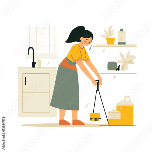 Woman sweeping floor in kitchen with dustpan and broom.