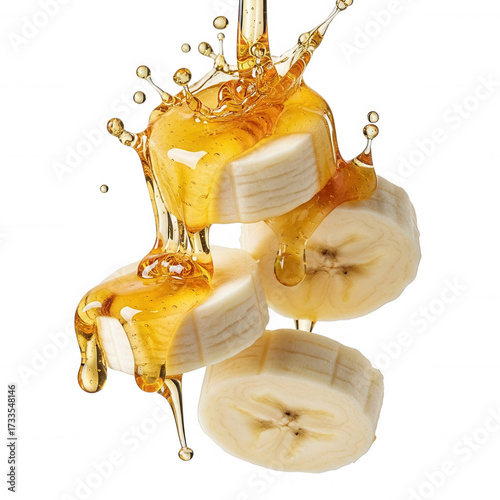 Banana slices drizzled with golden honey isolated on a transparent background