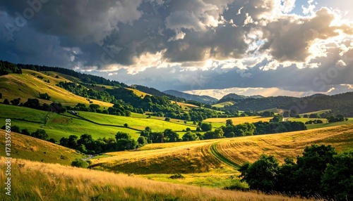 Golden Sunset Over Green Hills With Soft Gradients in Cloudy Sky in Rural Landscape Wide Panoramic View