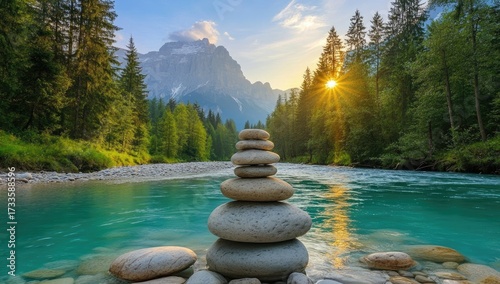 Rock cairn above vibrant river, mountain, trees, sunburst