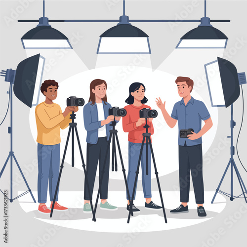 Photographers with cameras and lighting equipment in a studio setting photography