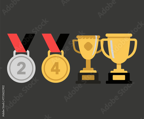 Silver and gold medals with trophies on a dark background