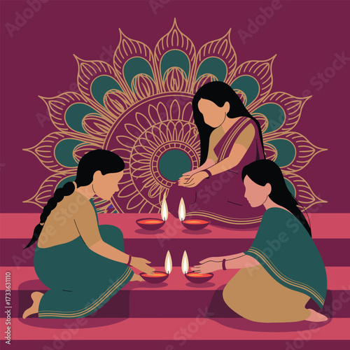 Three women in traditional Indian attire lighting diyas for Diwali festival celebration