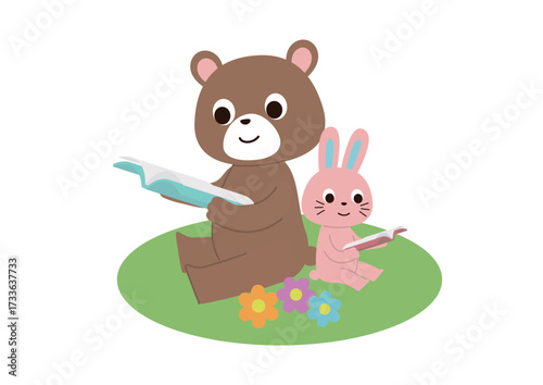 原っぱで一緒に座って本を読んでいるくまとうさぎ
