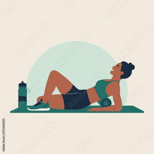 Woman using foam roller for back massage on yoga mat with water bottle exercise