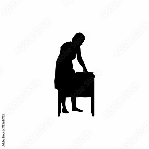 Seller arranging handmade jewelry at craft fair silhouette isolated on white background