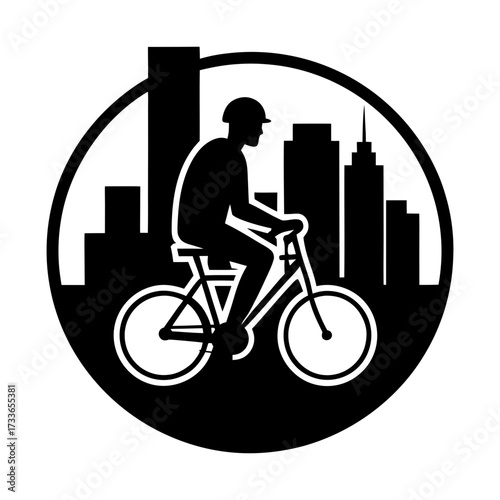 Silhouette of a cyclist riding a bicycle with a city skyline in the background