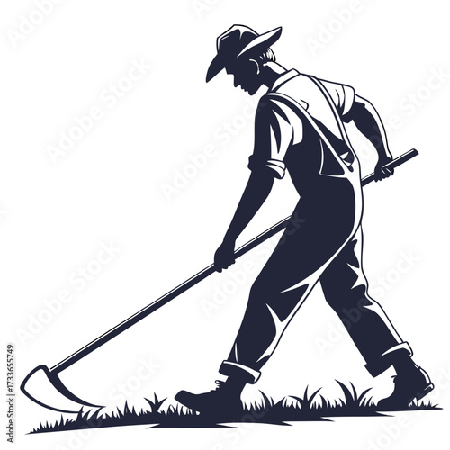 Farmer in overalls and hat working with a hoe in a field