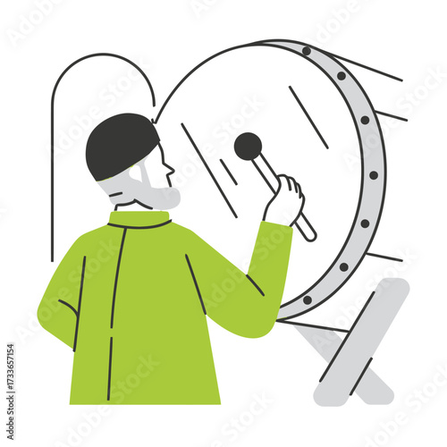 Energetic musician plays a large drum with a mallet creating rhythmic beats, perfect for cultural celebrations, music events, or lively performances.