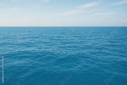 Fototapeta Naklejka Na Ścianę i Meble -  Deep Blue Ocean Water Texture Seascape with Clear Horizon and Light Blue Sky