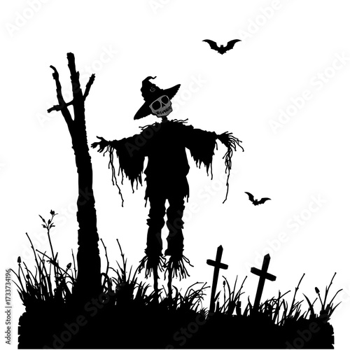 spooky scarecrow silhouette in graveyard with bats and bare tree for halloween
