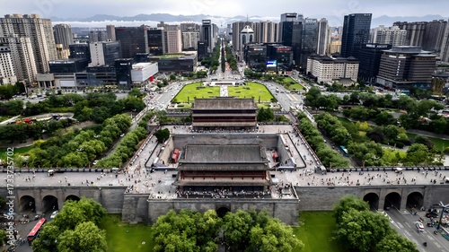 Photos Xi'an Bell Tower with Ancient City Wall and Modern Skyscrapers After Rain, China