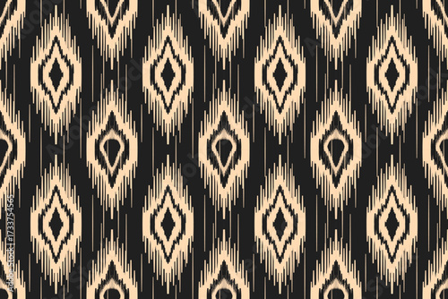Ethnic seamless ikat pattern fabric design for all types of print textile and background	