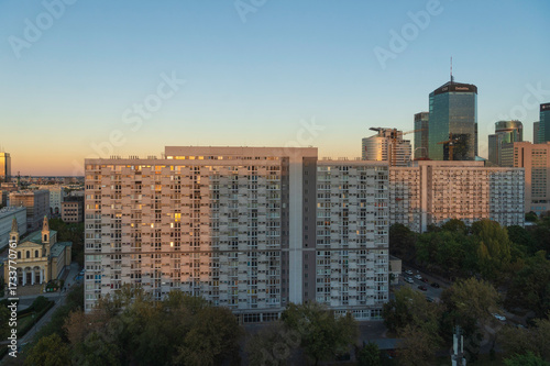 Warsaw Wola district – Za Żelazną Bramą estate with high-rise residential blocks and church on Chłodna Street at sunset
