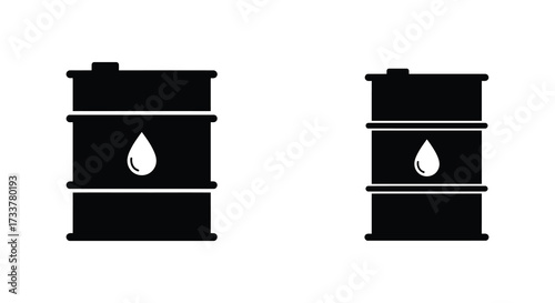 Two black oil drums with leaking droplets against a white background