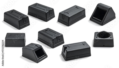 Nine black plastic enclosures, various shapes and angles, on a white background