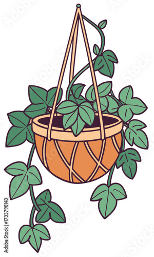 A hanging plant in an orange, woven-style pot is suspended by three tan straps. The lush green leaves trail down with visible veins, creating a decorative indoor garden accent.