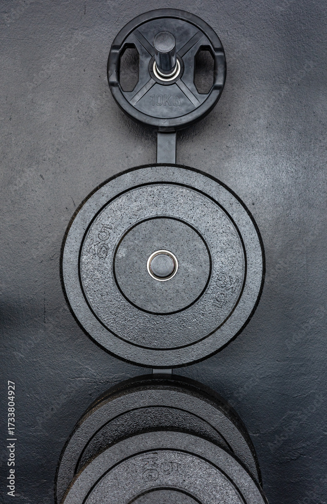 Obraz premium barbell discs in an athletic gym