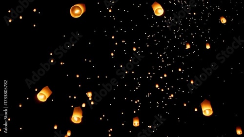 Enchanting Sky Lanterns at Yi Peng Festival, thousands of floating fire paper lanterns in the night sky Chiang Mai Province, Northern Thailand, Asia.