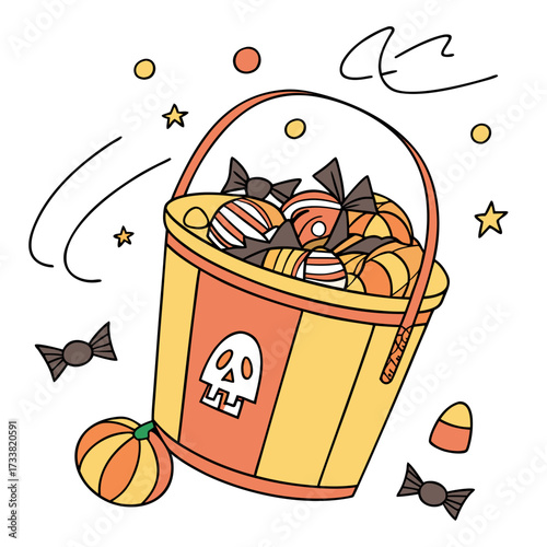 Halloween trick or treat candy bucket with skull and candies