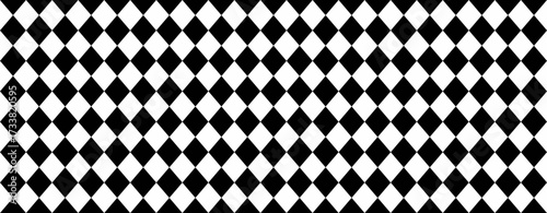 Abstract black and white diamond pattern.  Stylish geometric design perfect for backgrounds, textiles, or website design.  Creates a bold, graphic impact, symbolizing contrast and balance.
