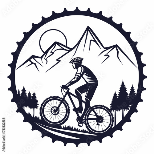 Silhouette mountain biker riding through pine trees and mountains