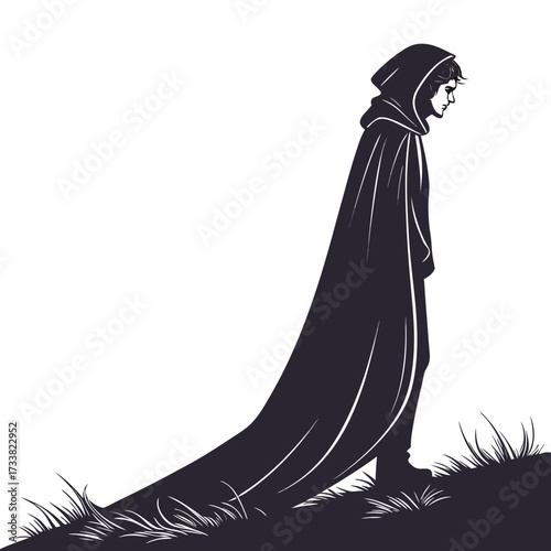 Silhouette of a person in a long hooded cloak standing on grass
