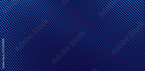 Blue halftone pattern with circular dots creates a modern, textured background with gradient effect, ideal for tech or design projects, showcasing depth and contemporary style