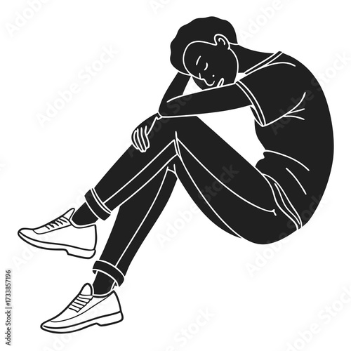 Black silhouette of a person sitting with head down