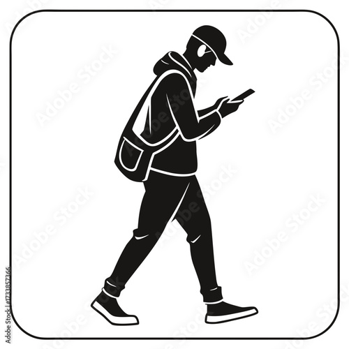 Black silhouette of a person walking with headphones and phone