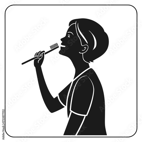 Silhouette of person brushing teeth with toothbrush