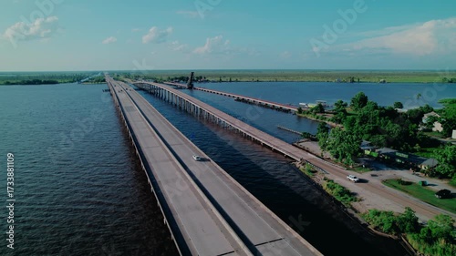Wallpaper Mural Aerial Shot of a Long Highway Bridge Spanning Coastal Waters in Louisiana. Torontodigital.ca