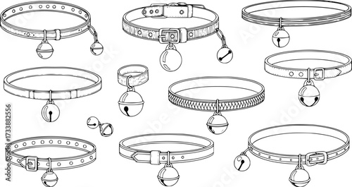 collection of black collars with pendant bells on a white background
