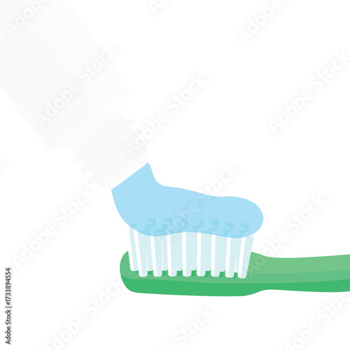 Toothpaste applied on toothbrush, isolated on white background