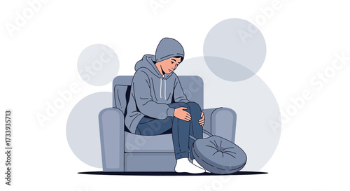 A young person with a somber expression sits alone in an armchair feeling isolated