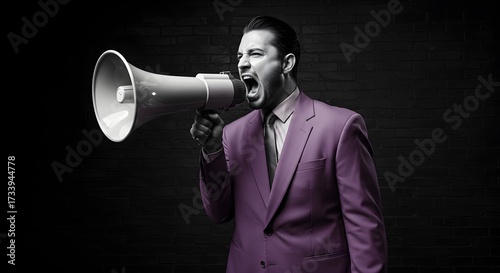 Man in suit shouting through megaphone communication and announcement concept