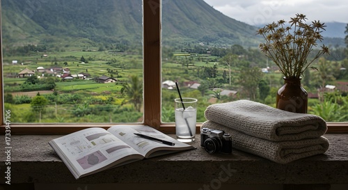 Scenic view through window with book drink and cozy elements