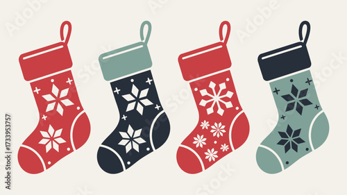 Four christmas stockings with snowflake patterns in red blue and green on a white background