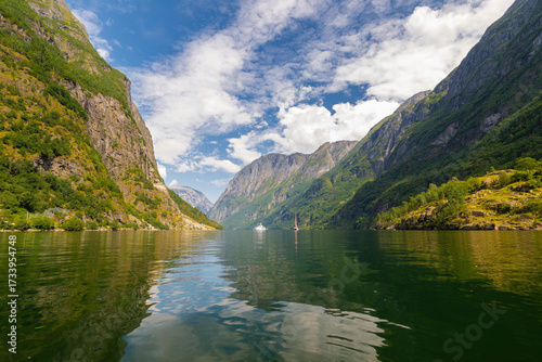 A beautiful Summer day in the UNESCO-listed Naeroyfjord in Norway, which is the most beautiful and wildest arm of the Sognefjord with at the end the picturesque village of Gudvangen, where you can sta