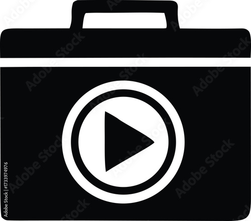 Simple black and white icon representing a video camera with a play button symbol on its front surface a digital representation of media creation