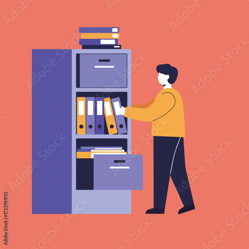Person organizing binders in a cabinet with stacked books on top