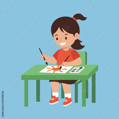 Young child focused on painting a sun on paper at a green table