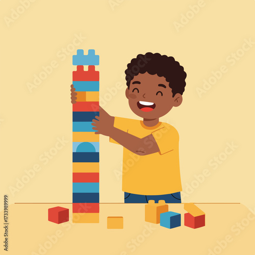 Joyful child building a tall tower with colorful blocks