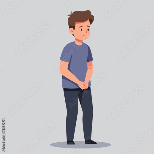 A young, anxious boy stands with hands clasped and a sad expression