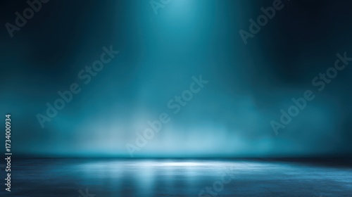 Dramatic blue-teal background with fog and spotlight reflections on a wet, dark floor. Creates a mysterious, atmospheric stage effect, blurred blue background