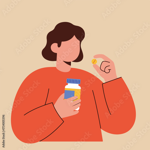 Person in red shirt holding pill bottle and yellow capsule