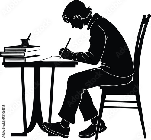 Young person writing at desk in silhouette